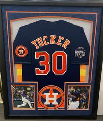 K.TUCKER AUTOGRAPHED FRAMED JERSEY 202//237